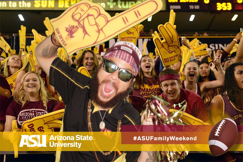 Enthusiastic crowd at Arizona State University's Family Weekend with a man in the foreground holding a foam finger in Tempe